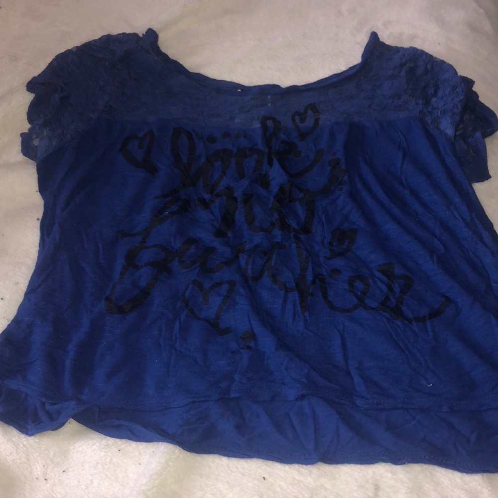 Crop top royal blue shirt.
